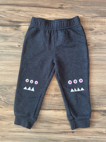 2T Cat & Jack joggers with monsters on knees